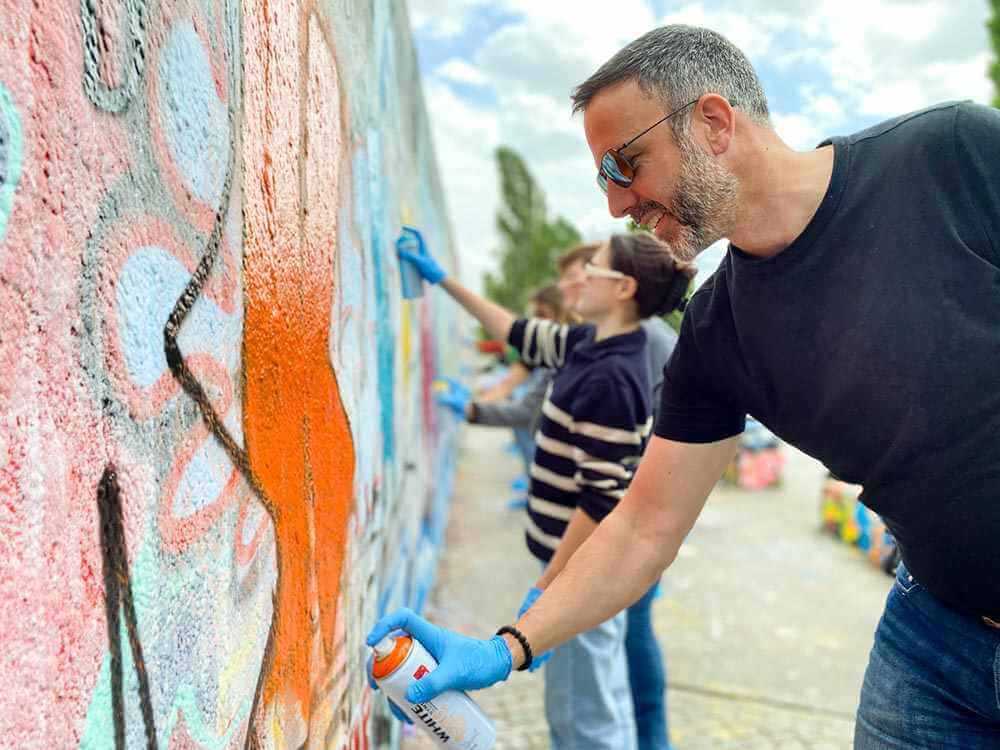 From Subway Cars to the Berlin Wall: The Comprehensive History of Graffiti Art and its Legacy