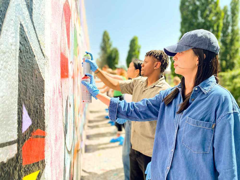 Authentic Berlin Graffiti Experience: The Ultimate Guide to Painting the Berlin Wall at Mauerpark